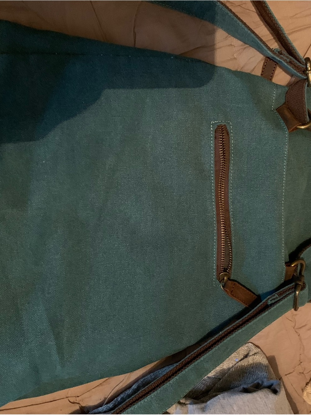 Teal Canvas and leather trim back pack Bag.  Heavy duty. Well made. Used twice